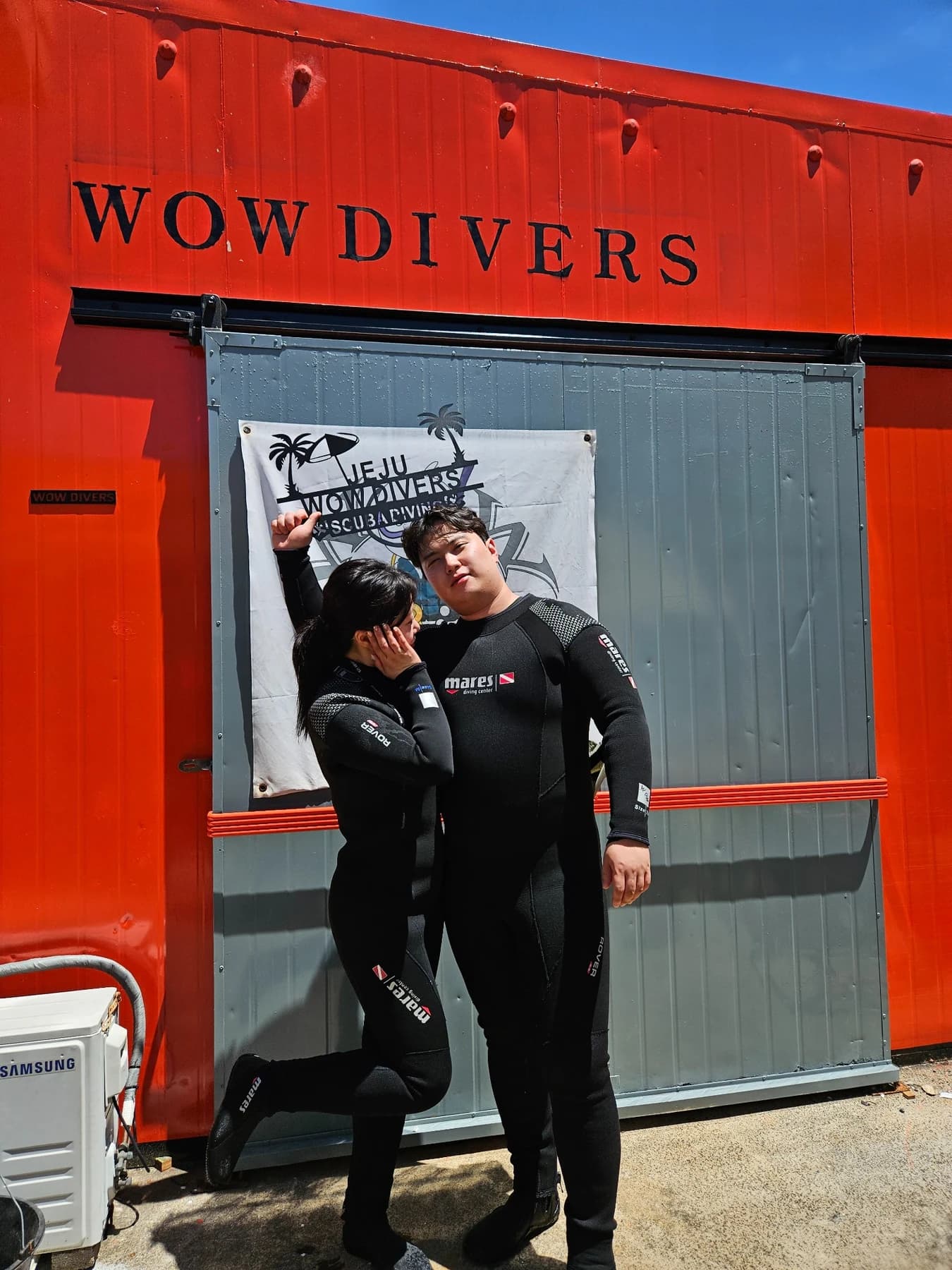 Divers outside Wow Divers after a visit