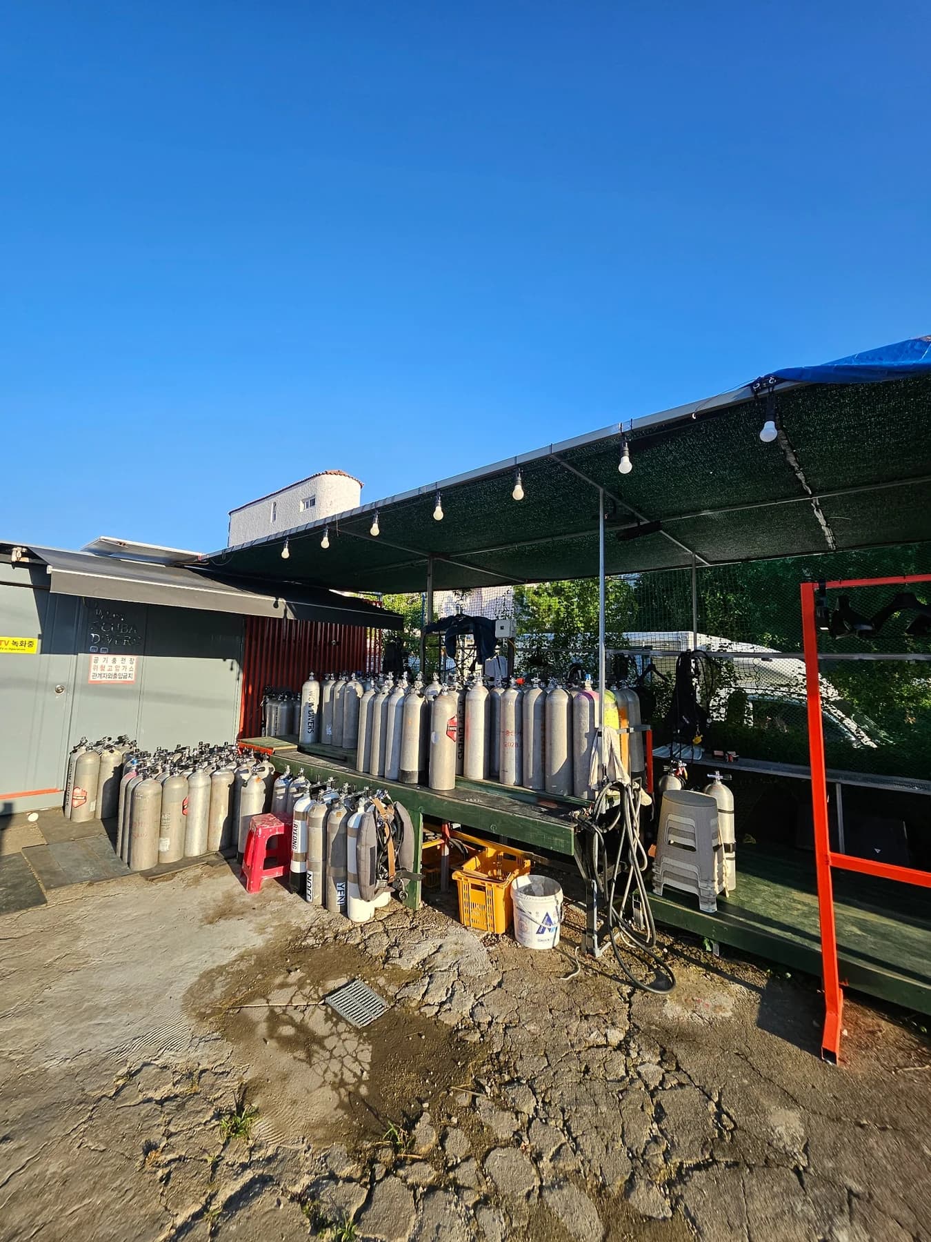 Scuba tanks and dive equipment stored at Wow Divers