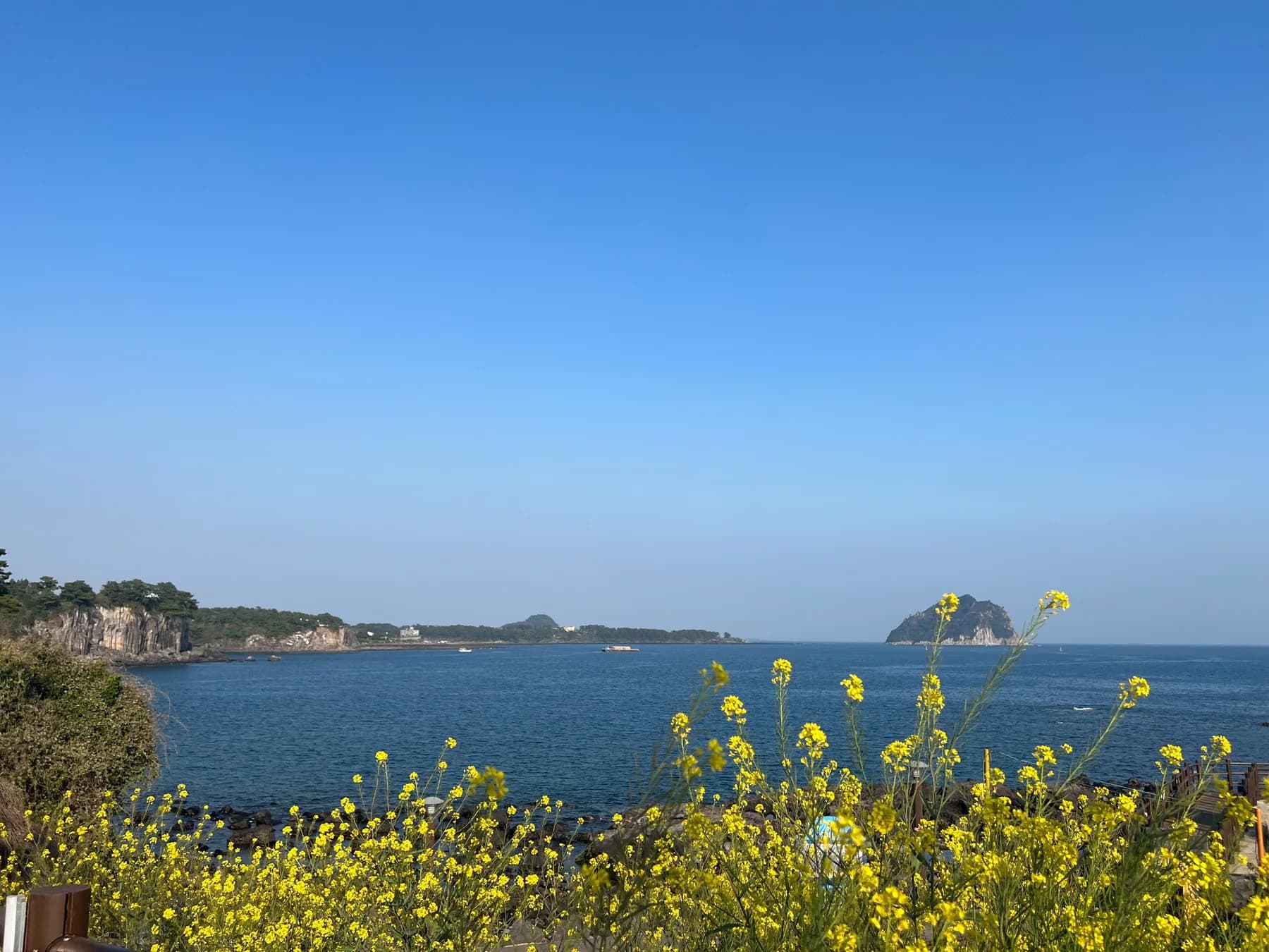 Seogwipo Port overlooking Munseom and the sea off southern Jeju