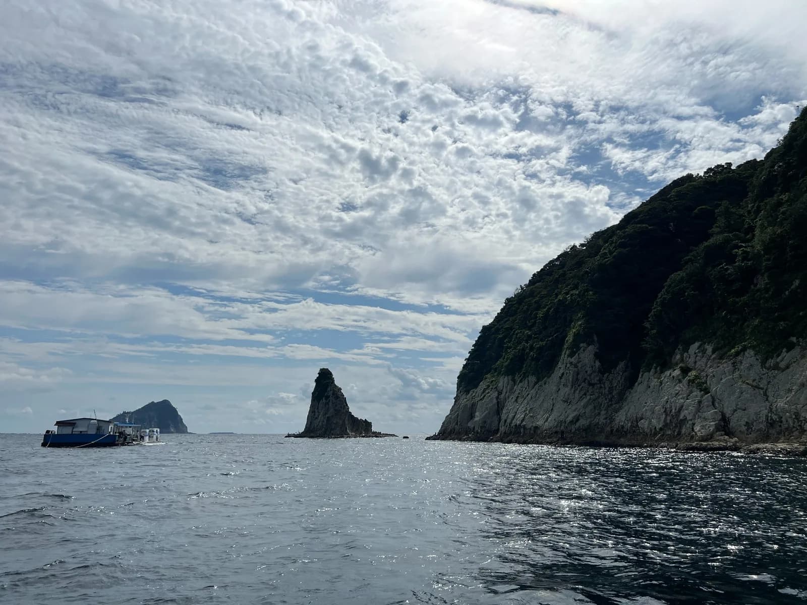 The cliffs of Munseom seen up close from a boat